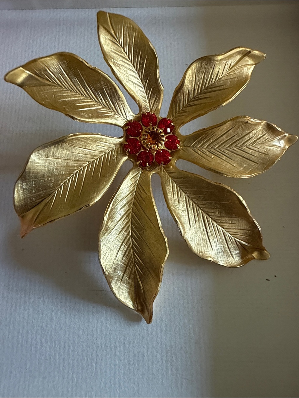 Gold vintage Floral Brooch with Red Crystal Center